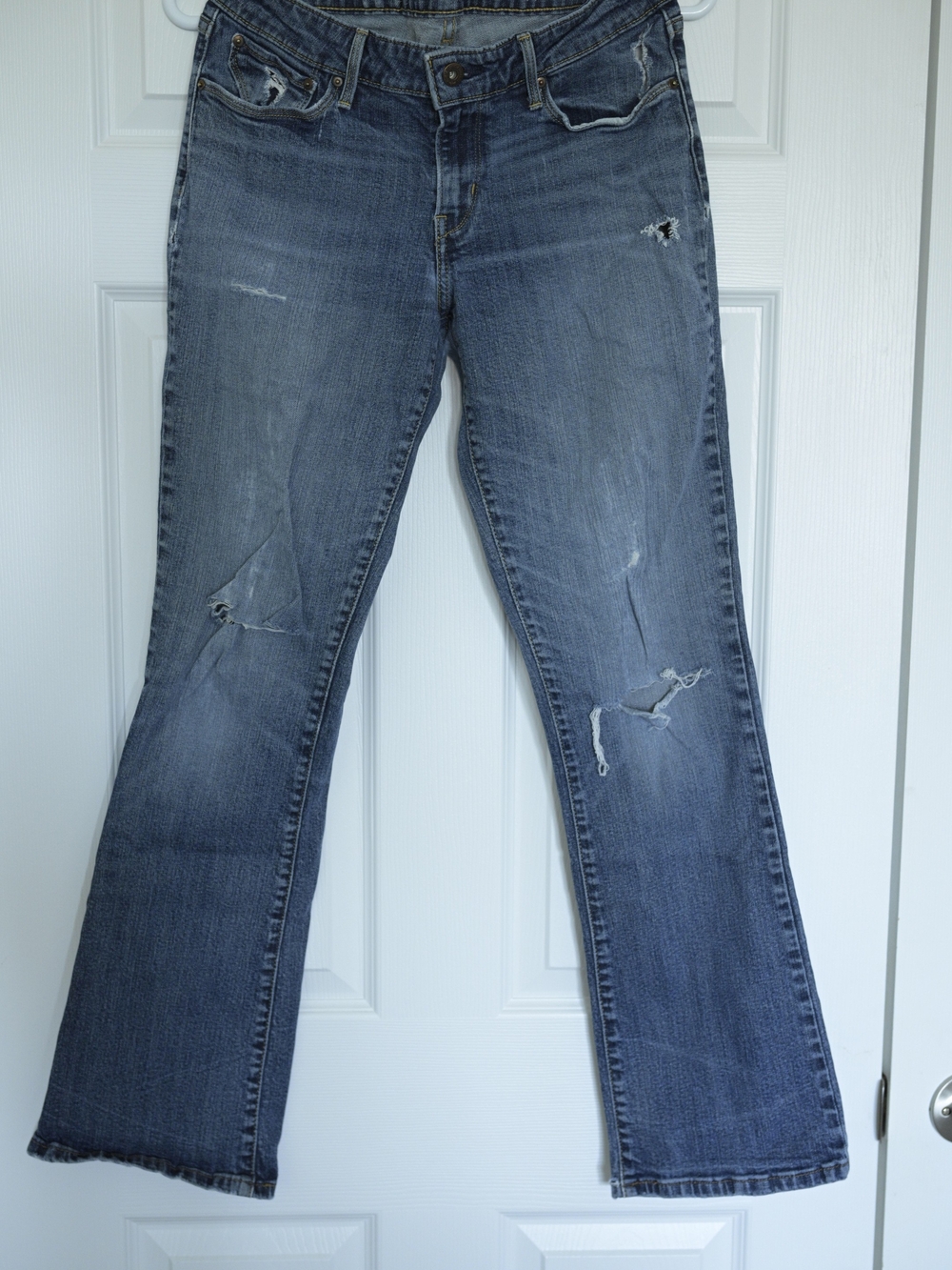 Levi's Distressed Medium Blue Flare Jeans